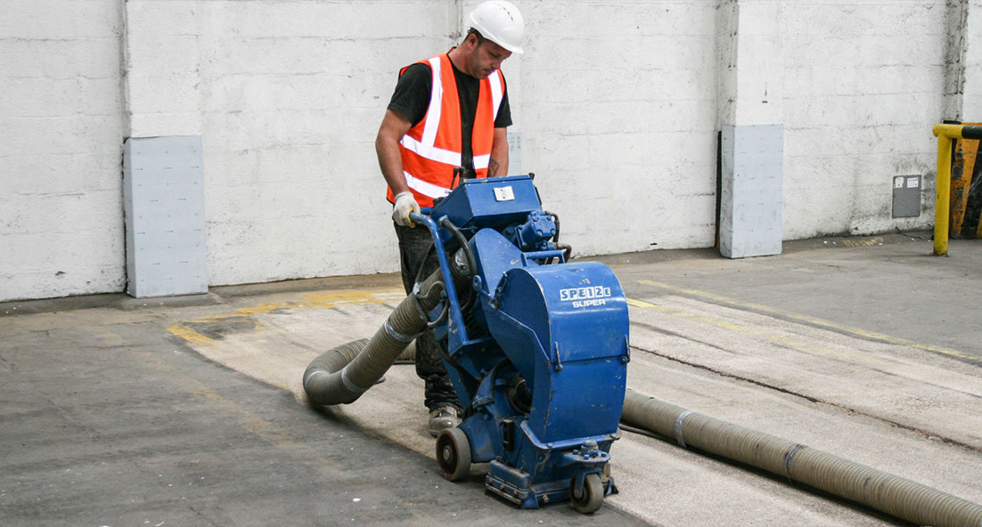 installer preparing floor surface