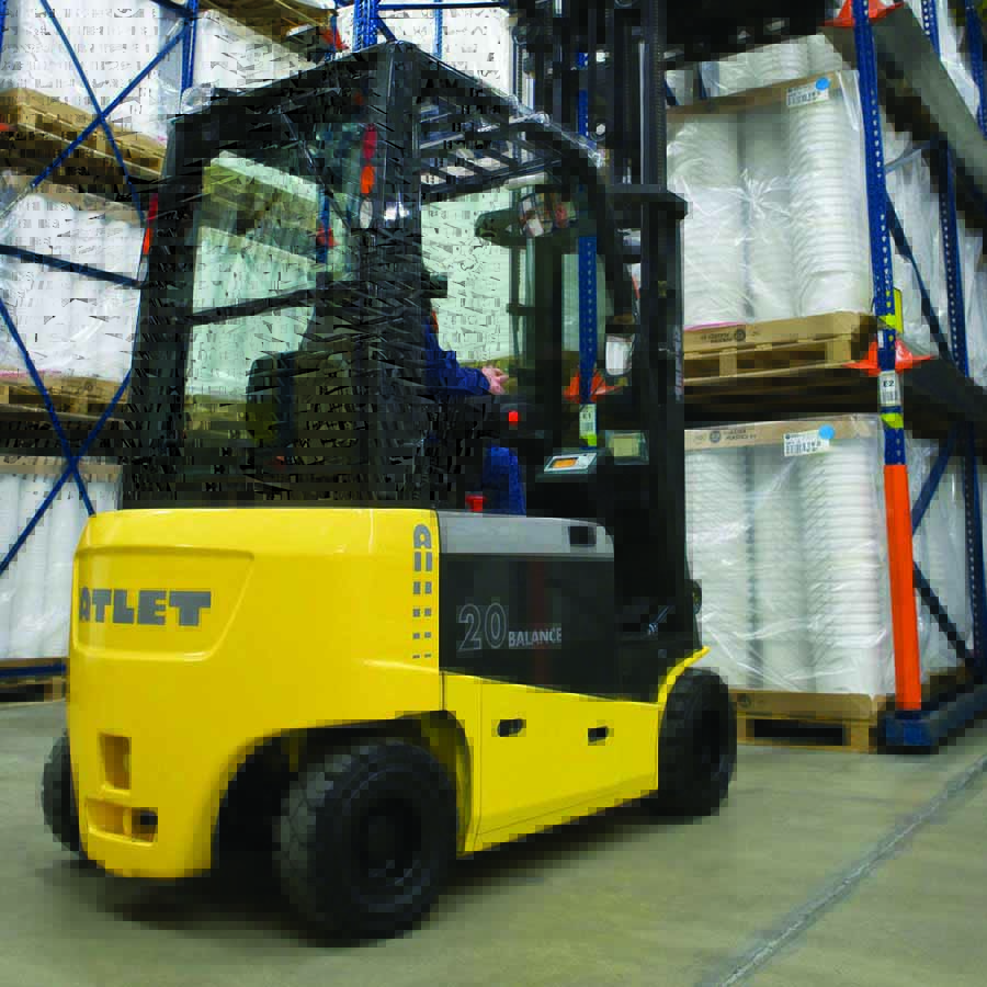 Forklift truck in warehouse